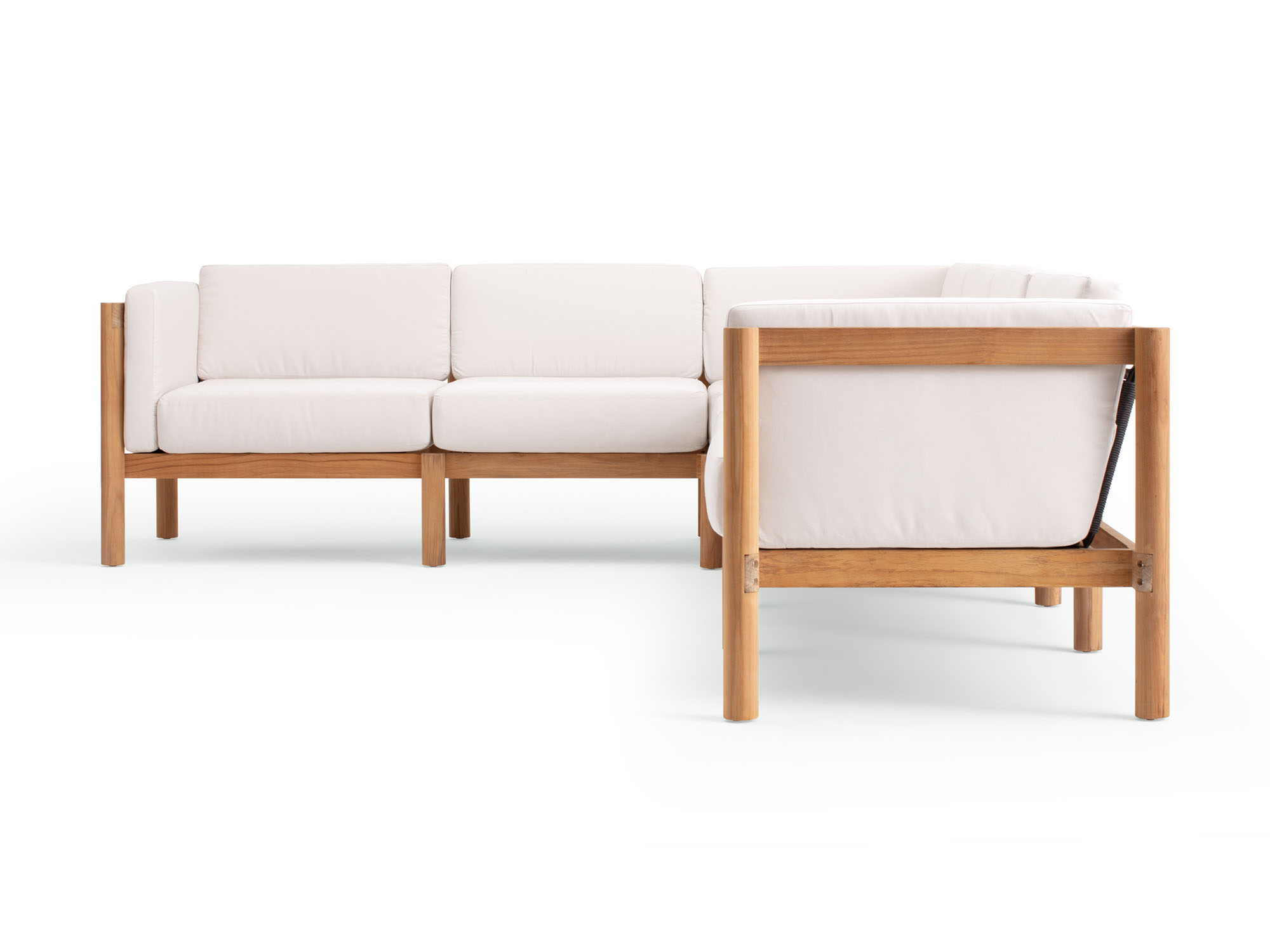 Side view of 6-piece outdoor sectional with white arm cushions